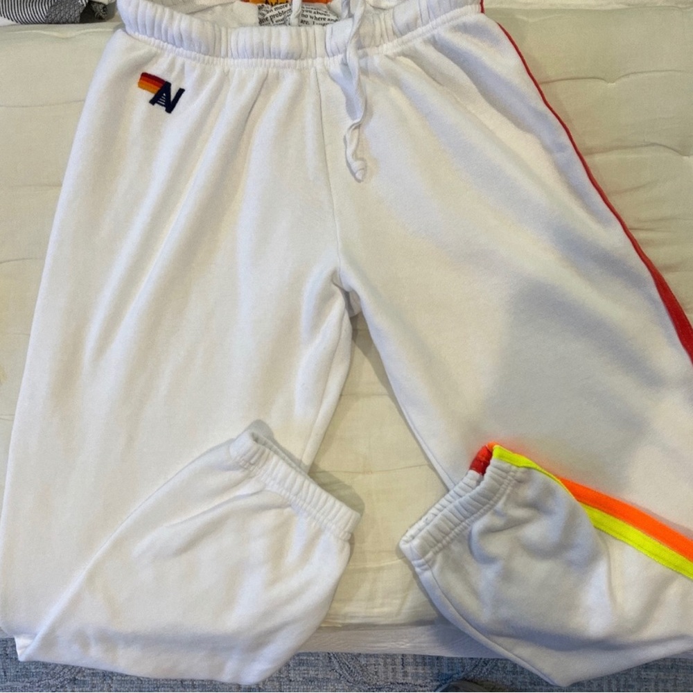 White five strip AV sweatpants